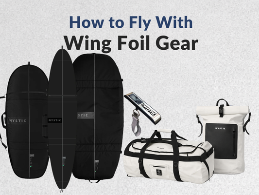 Wing foil travel gear setup with board bags, duffel, dry backpack, and luggage scale on a clean background